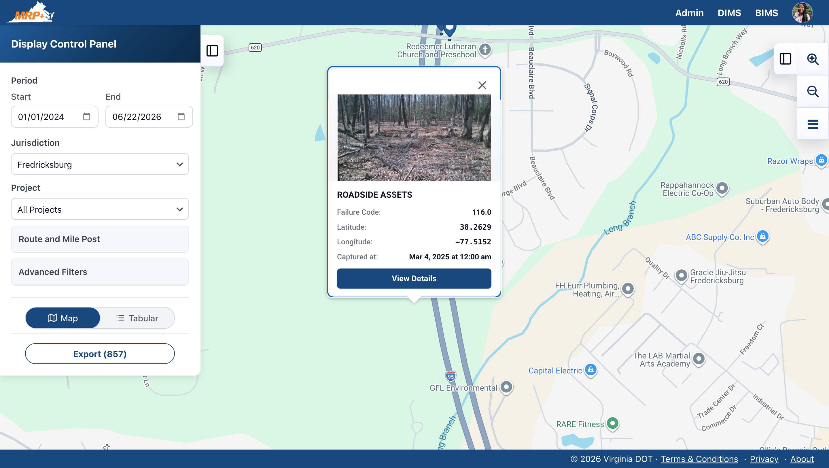 Current VDOT MRP production dashboard: a styled map with a highlighted asset location, a branded Display Control Panel on the left, and an open asset detail popover on the right showing an inline inspection photo, a failure code, and geolocation coordinates.